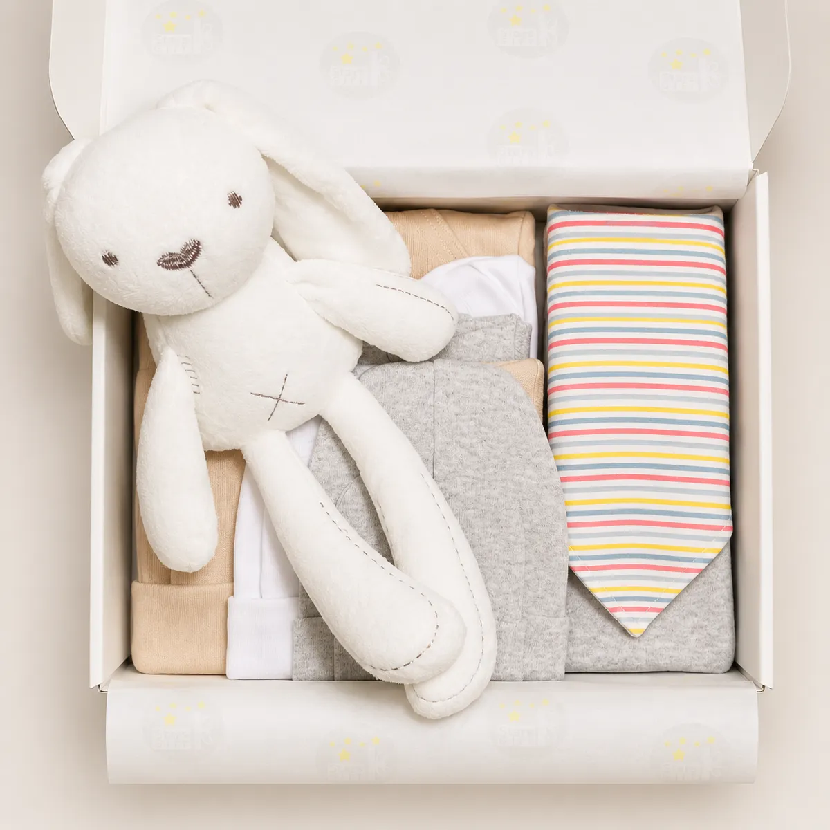 Peluche de apego para bebé recién nacido incluido en la Cajita Premium Esencial